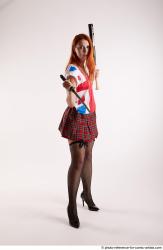 Tina STANDINGPOSE WITH DAGGER AND BASEBALL BAT 